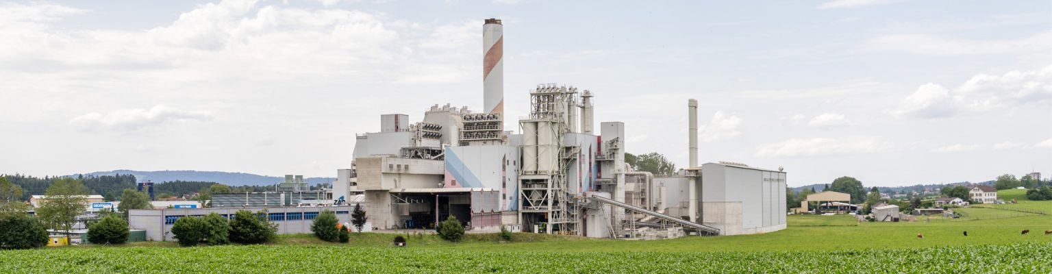 Corn Harvest and Processing Silos by Autumn Agricultural Farm Field